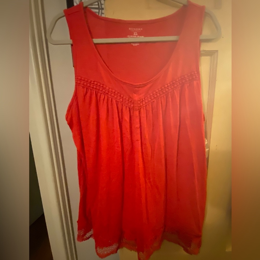 Red tank top with crochet details
